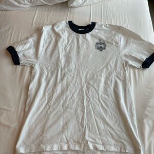 Naval Academy t-shirt no stains white w/blue banding on neck and sleeves Lg.